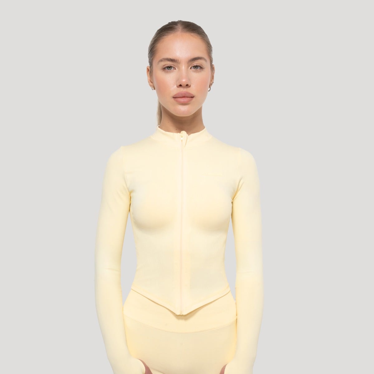 Ženski športni top Luma Butter Yellow - GymBeam
