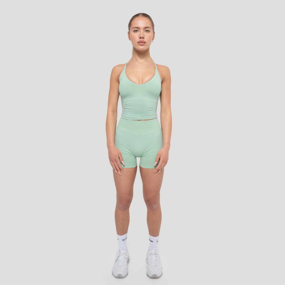 GymBeam Ženska majica brez rokavov Luma Pistachio - Velikost: S | Barva: zelená | Teža: 0,107 g | Pakiranje: 140 · záber 6